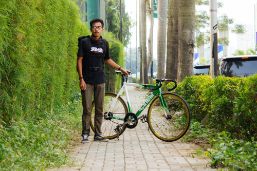 Cyclists of Jakarta - Fauzan Wildan. 18 years young. Avid fixed gear rider. Delivers stuff for Westb