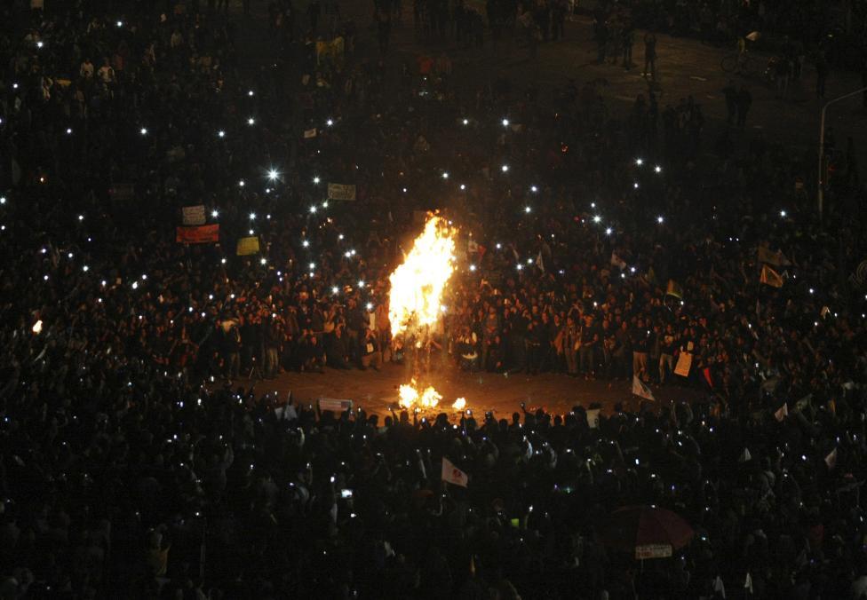 massconflict:  Tens of thousands of people dressed in black have marched through