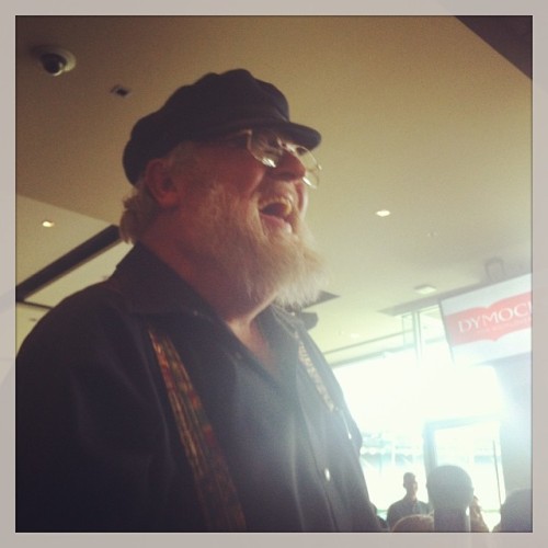 Believe it or not but this actually NOT George RR Martin. Just his look alike sitting right behind m