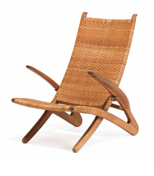 Hans J. Wegner, foldable “Dolphin” chair, 1950. Oak. Made by Johannes Hansen. Denmark Via Bruun Rasm
