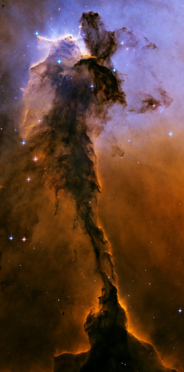 The Eagle Nebula is a region of star formation, ranging at about 90 trillion kilometers long. To put