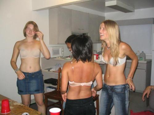 A wonderful embarrassed strip beer pong game, with a large group of cute girls getting down to their