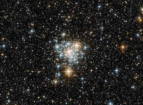 NGC 299 is an open star cluster located within the Small Magellanic Cloud just under 200,000 light-y