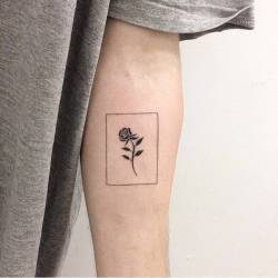 tattoofilter:  Black rose tattoo on the inner