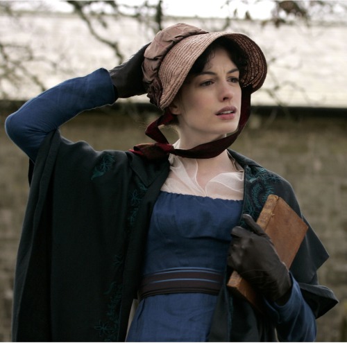 Anne Hathaway with book as Jane Austen in Becoming Jane (2007).The year is 1795 and young Jane Auste