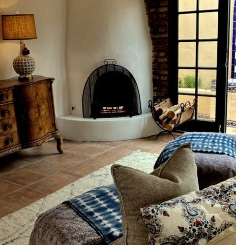 Mediterranean Living Room - LibraryExample Of A Mid-sized Tuscan Open Concept Living Room Library With