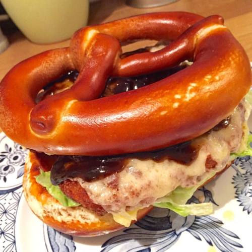 The chicken schnitz-pretzel burger Two breaded chicken burgers covered in melted cheese, smothered w