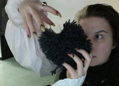 Here’s a picture of me from a few months ago when I was making a very large pompom for a school assi