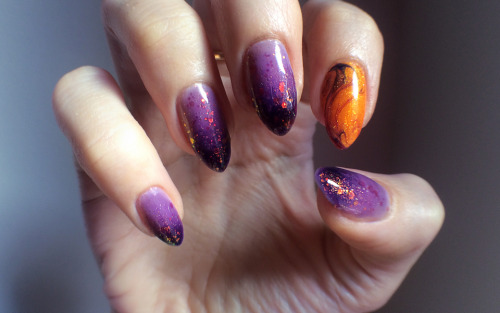 snailfart:  The cauldron spilled over. Purple ombre / jelly sandwich, bottom —› top: Zoya Miley L’Oreal Lilac Coolers L’Oreal Berry Nice Max Factor Fantasy Fire Kleancolor Chunky Holo Black Orange swirl dry marble: Sinful Colors Cloud 9 Sinful