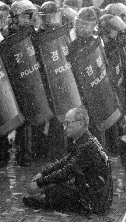  “I wanted you to see what real courage is, instead of getting the idea that courage is a man with a gun in his hand.” - To Kill A Mockingbird Peaceful Protest in South Korea, 2011 
