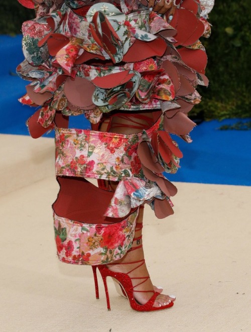 Rihanna on the Red Carpet wearing Comme des Garçons at the Costume Institute Gala at the Metropolita