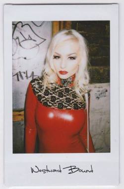 westward-bound-latex:  The stunning Romanie Smith in Westward Bound&rsquo;s Bordelle-L'Amour Rose &rsquo;#Latex #Dress shone at the Torture Garden Birthday Ball 2014 Torture Garden Official Fan Club. Photo: Kyle.Dress: www.westwardbound.com/R1071