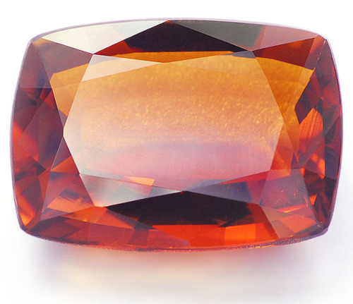 Beautiful four carats cushion shaped honey Tourmaline from Madagascar displays rich,vivid color. 