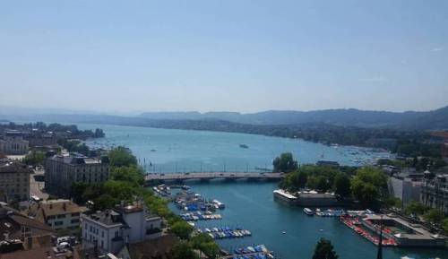 Breathtaking view after going up the tower ...#grossmunster #tower #stairs #water #lakezurich #blues