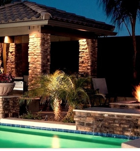 Phoenix Mediterranean PoolLarge Tuscan Backyard Stone With A Naturally Shaped Pool House Image