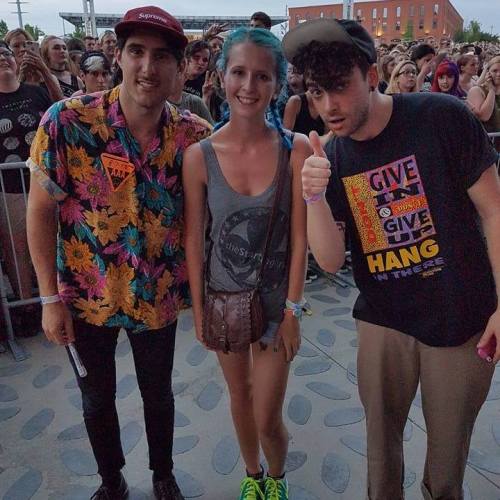  Taylor York and Zac Farro with a fan, Josie at Twenty One Pilots show in Nashville, TN on August 7t