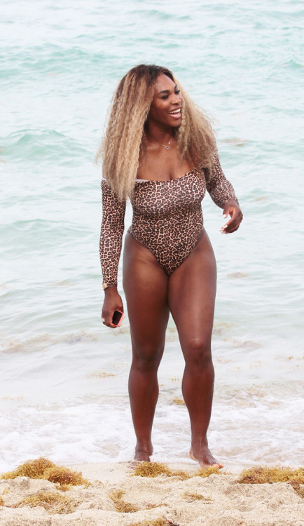 Oh, my God, did you see that Serena Williams crashed a wedding while wearing a leopard print swimsuit???  Damn, she is one thick, yummy piece.  The tits, the nails, the hair, the thighs…  And the way her suit shows off her tennis-hardened ass?! 