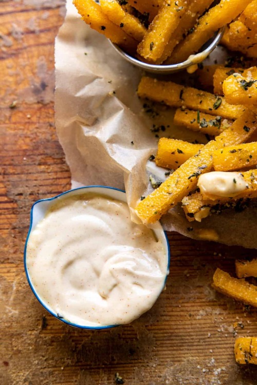 yummyinmytumbly:    garlic parmesan herb butter polenta fries with lemon aioli by Half Baked Harvest  