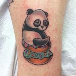 fuckyeahtattoos:  I atez too many donuts. Sad panda tattoo on Stacy by Candeeo at Autumn Moon Tattoo in Anaheim, CA  IG: @candeeo goldenbough.tumblr.com 