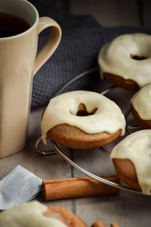 sweetoothgirl:  Baked Chai Latte Doughnuts and Vanilla Bean Icing  
