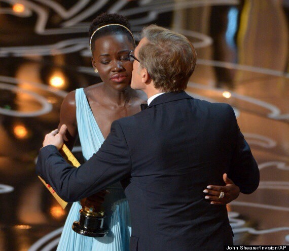 madschristoph:  Lupita is literally living the dream with all of that man candy.