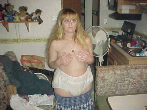 abdlpiclover:Oldie made to reveal her night-time diaper.  a real incontinent woman