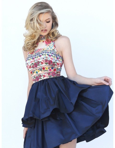 Multi-colored floral embroidery adorns the bodice with round collar neckline, cut-in shoulders and c