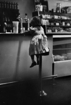  Terrence Spencer :: Mavis sipping a strawberry milkshake in a white milk bar, aka Girl at a soda fountain counter or Girl in diner, 1953 [Getty Images - Terrence Spencer]  