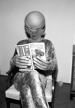 broadcastarchive-umd:  Actor in costume from “Keeper of the Purple Twilight,” an episode of the original The Outer Limits television show on ABC. It first aired on 5 December 1964, during the second season. The uncredited actor is reading Famous Monsters
