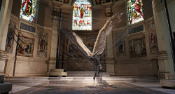 unexplained-events:  Lucifer (Morningstar) A wax sculpture depicting the devil snared in a set of power lines built by Paul Fryer. The sculpture is illuminated by the church’s stained glass windows. It can be seen at The Holy Trinity Church in Marylebone,