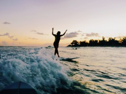 caseykaui:  sister and i surfing awhile ago