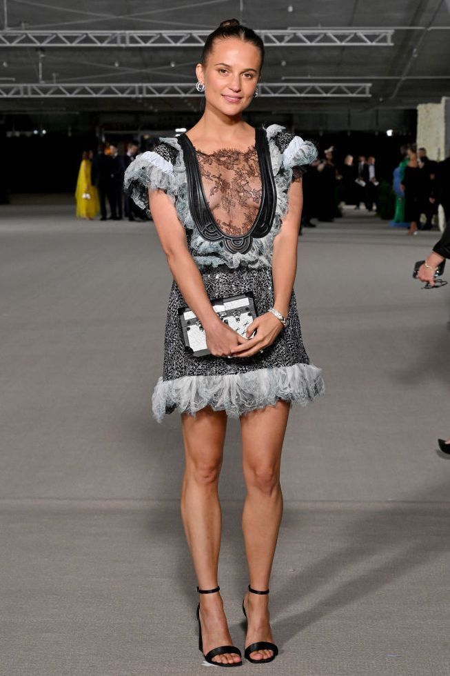 Alicia Vikander wore navy Louis Vuitton dress @ Firebrand Cannes photocall