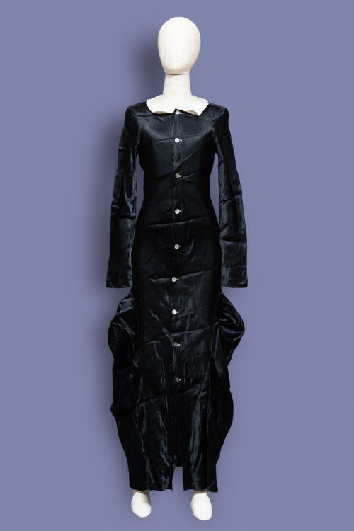 Comme Des Garcons black satin deformation dress with white collar, probably 1980s.