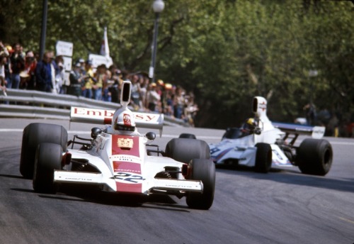 Rough duel… Rolf Stommelen (Embassy Racing with Graham Hill) being chased by Carlos Pace (Mar