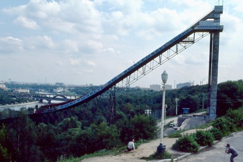 Cityscape With River, Ski Jump, Lamp Post, Photographer and Model, Moscow, 1976. (Городской пейзаж с