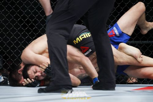 Demian Maia chokes out Carlos Condit during UFC Fight Night, Aug. 27, 2016.Picture by Esther Lin, ht