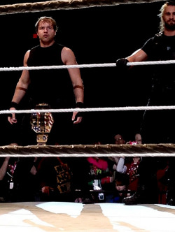 Dean wearing his title Johnny Nitro style