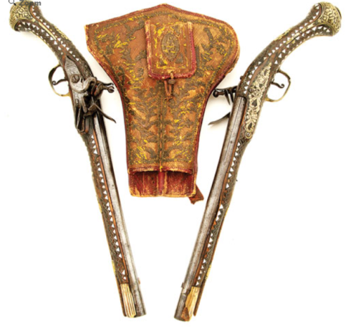 A pair of ornate flintlock pistol with original holster, originates from Turkey, 19th century.