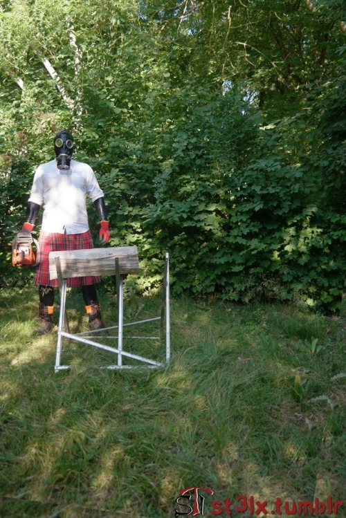The Rubber Highland Games 2018 - Part 3 of 7Rubbered husband cutting wood in the garden
