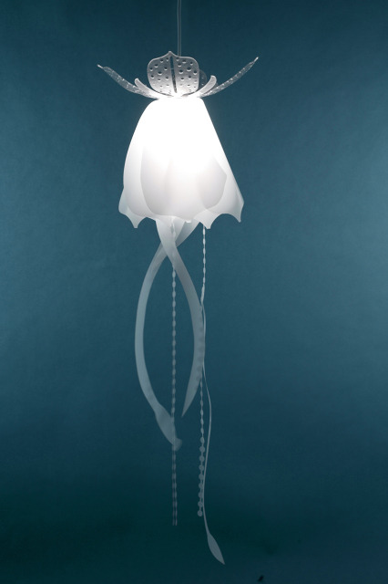 A collection of lamps made of laser-cut mylar that appear as floating jellyfish.