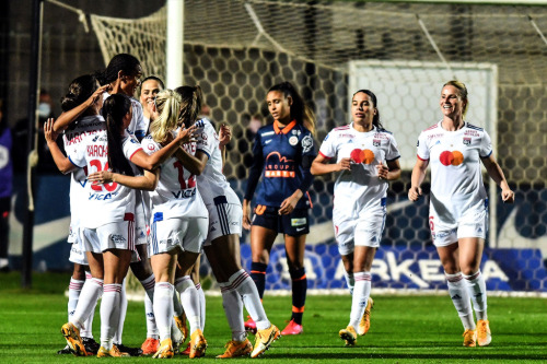 Wendie Renard of Lyon celebrates with teammates during the D1 Arkema match between Montpellier and O