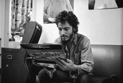daria-greene:Bruce Springsteen looking at his first album for the first time