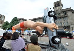 choujyu:  there’s now a 7m tall statue of giant baba german suplexing a car in kyoto  