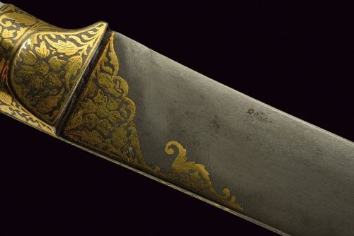 art-of-swords:  Kard Dagger Dated: late 19th century Culture: Indian Medium: steel, rock crystal, gold, iron Measurements: overall length 30.5 cm The dagger has a straight, single-edged blade of damask steel, decotated with koftgari gold inlays depicting