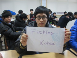 chanyeol-inc:  kyeoming:  spoiledvanillasoymilk:  xbean:  koreanstudentsspeak:  Fucking Korea   Dude behind him is like “I know wut dat sayz. Why you do dat? Wass wrong wit Coreah? You wrack anyways witcha bowl cut and G-Unit coat.”  ^^ I’M IN TEARS