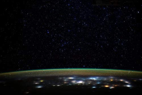 just–space:Glittering Lights of Earth As Seen From the Space Station : Stars glitter in the night sky above the Earth’s atmospheric glow. (via NASA)