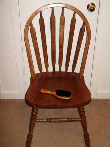 schooluniformpunishment:  This picture says it all. The straight back armless chair with a wooden ha