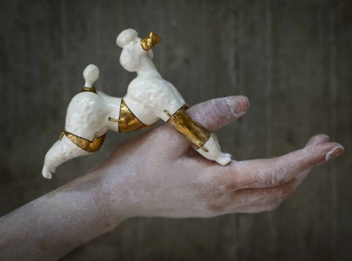 hazedolly:  Art jewellery by Qian Yang: gold-dipped salvaged antique china dolls, doll parts, and figurinesSource: Brown Paper Bag 