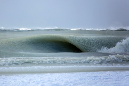 asylum-art: Jonathan Nimerfroh: Semi-frozen waves roll ashore in New EnglandPlummeting temperatures 