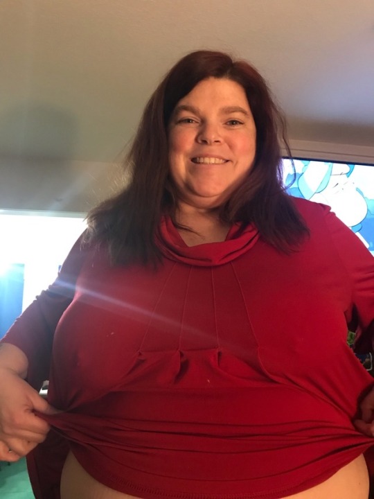cutehousewife0523:  You can just see my piercings through the shirt. 